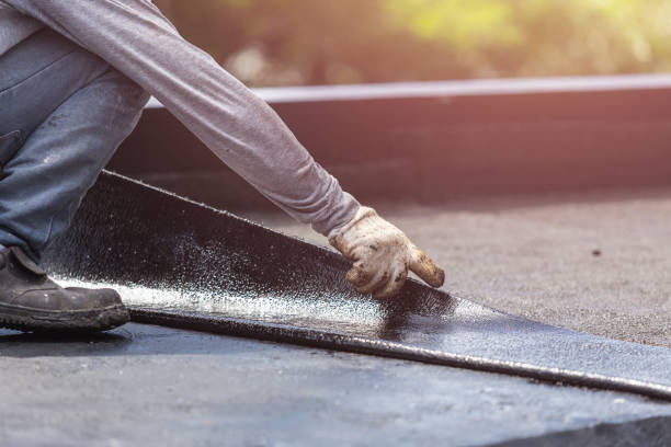 Professional Waterproofing technician working in White Cloud, MI